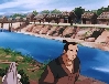 by the water
